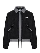 A black suede bomber jacket with a gray collar, zipper, and hem, featuring the Adidas trefoil logo on the chest, displayed on a neutral light gray background.