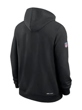 A black Nike Dri-FIT hoodie shown from the back, featuring a small NFL shield logo on the left sleeve and 'DRI-FIT' text near the bottom hem, set against a light gray background.