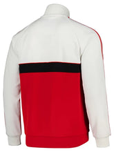 A white and red colorblock track jacket shown from the back, featuring a black horizontal stripe across the upper back and red stripes running down the sleeves.