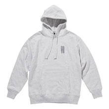 A light gray heather pullover hoodie with a small dark gray graphic on the left chest, displayed on a solid white background.