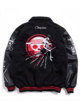 Black varsity-style jacket with leather-look sleeves, featuring a large back graphic inspired by One Piece, with red and white details and ribbed collar, cuffs, and hem.